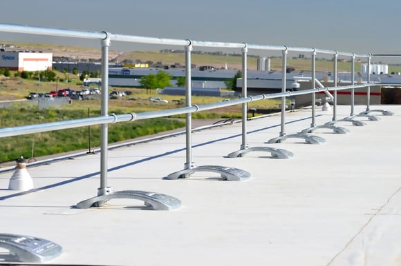 examples of passive fall protection systems: Rooftop Guardrail