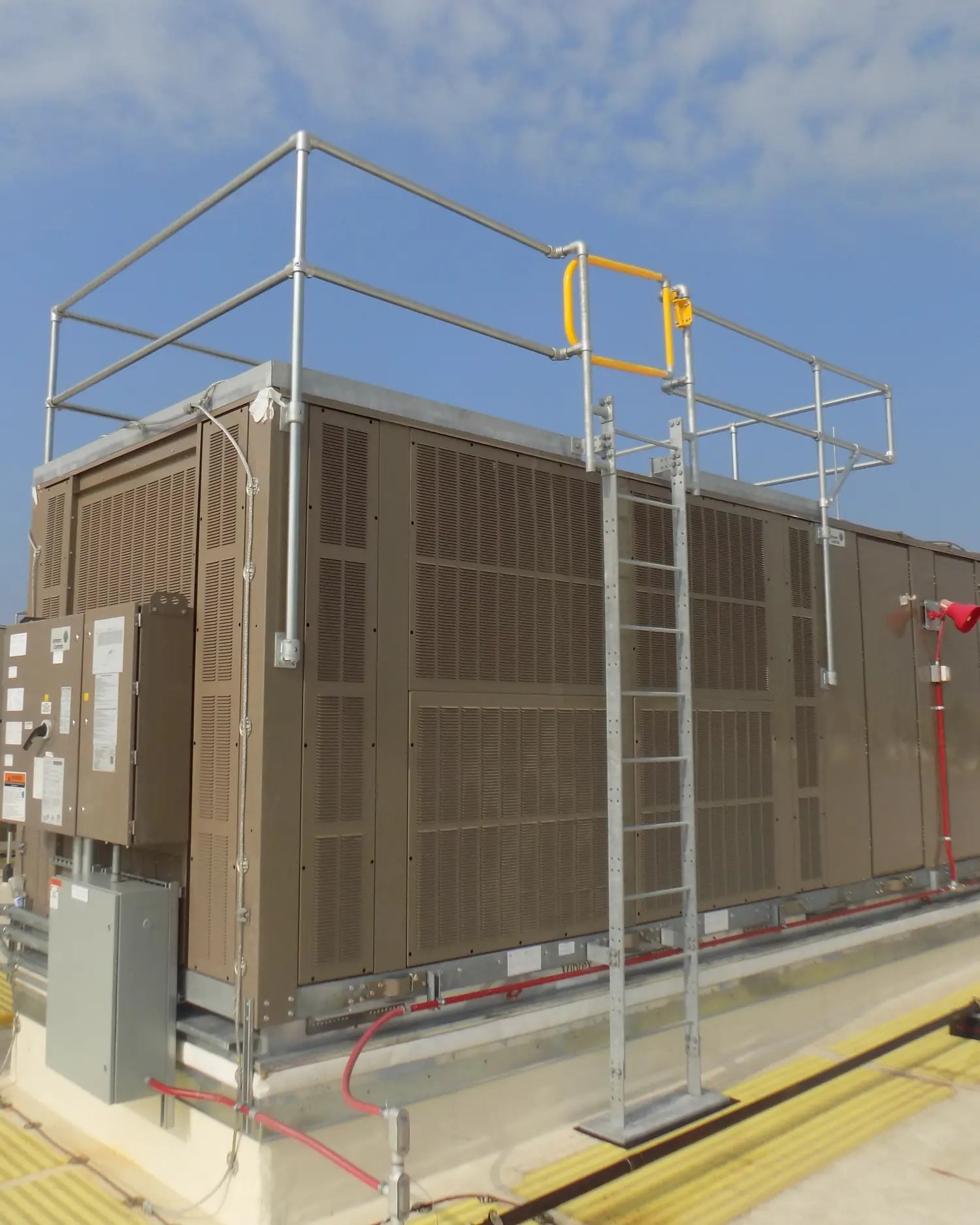 Guardrail and ladder system installed in a data center