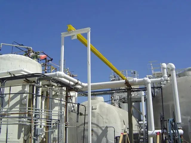 refinery with overhead rigid rail